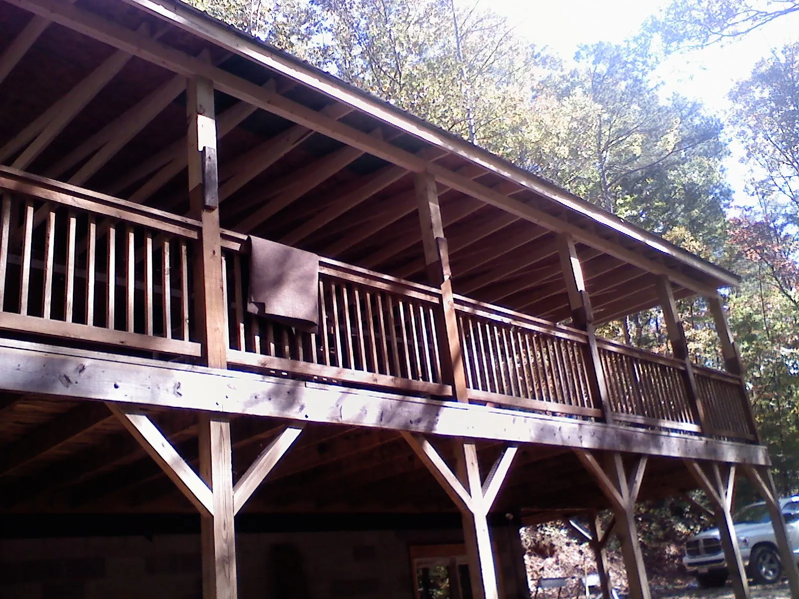 Timber framing under a new elevated porch and deck — Roof Leak Repair in Greene by Roofing Brothers